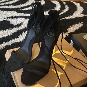 Lace up black sandal heels